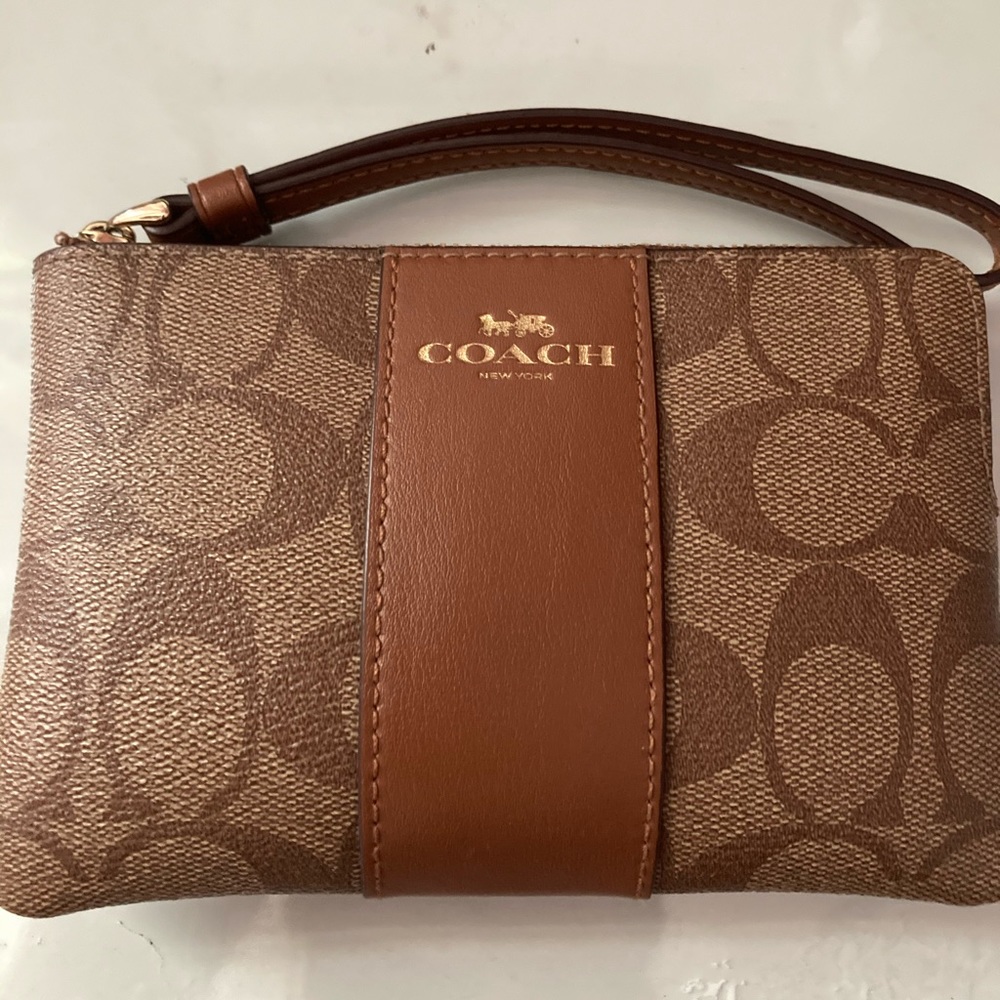 Signature canvas Coach wristlet wallet